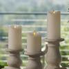imageMatchless Candle Co by Luminara Set of 3 3quot x 45quot55quot65quot Flameless LED Flickering Battery Candle Moving Flame Pillar Melted Edge Real Wax Smooth Finish Bright RedIvory